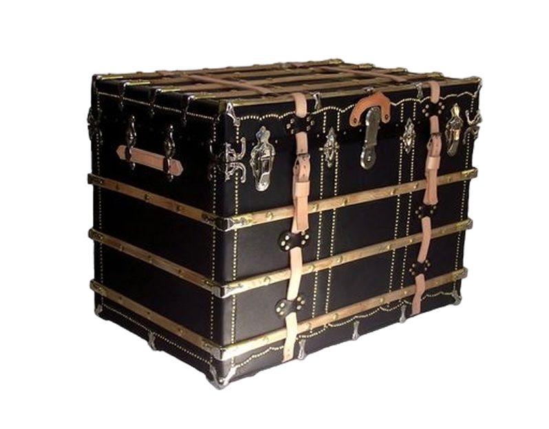 Vintage black leather trunk with metal accents.