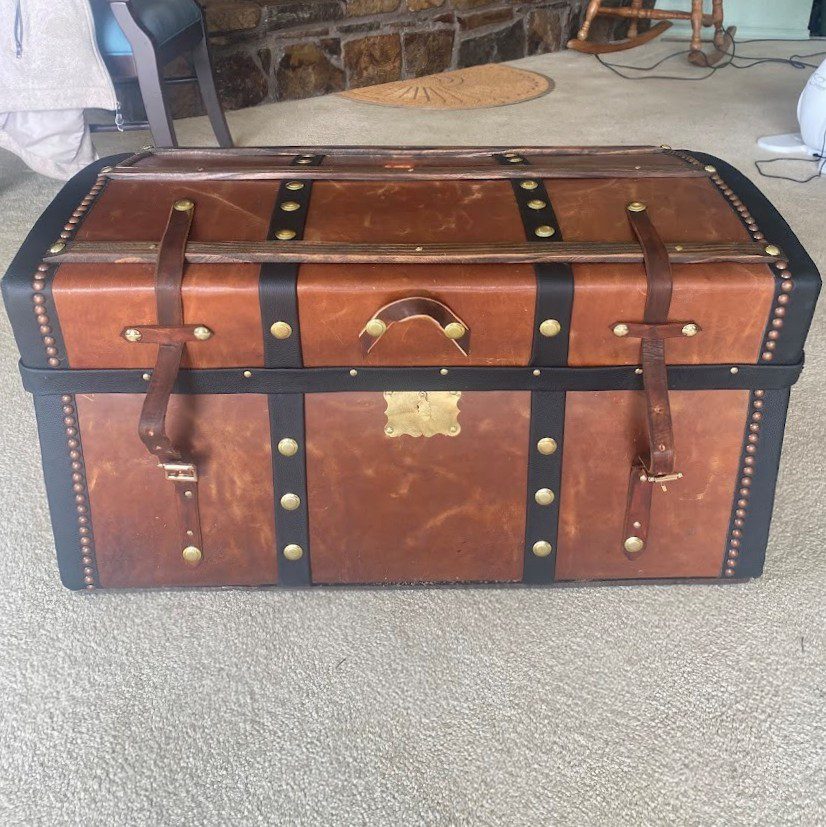 Vintage leather steamer trunk with brass accents